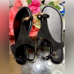 Elegant Black Sandals with Gold Accents